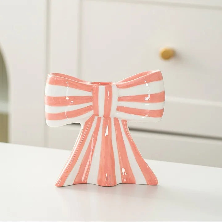 Striped ceramic bow candle holder in pink