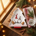 Gnome Christmas tree ceramic dish with gingerbread cookies on a wooden table
