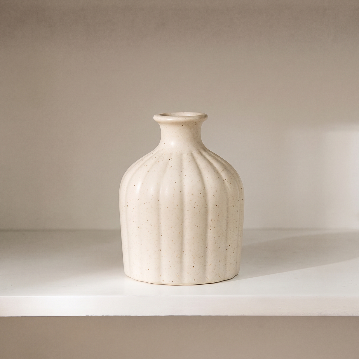 Matte white ceramic vase, fluted shape