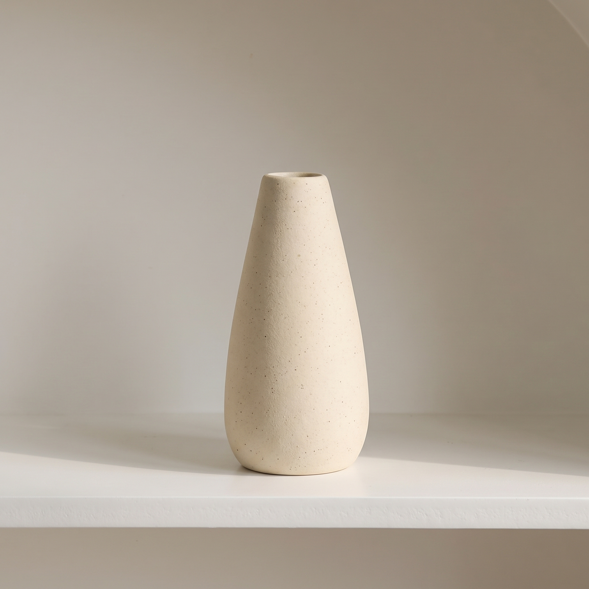 Matte white ceramic vase, slim teardrop shape