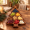 Christmas tree wooden charcuterie board filled with cheese, fruit and nuts on a rustic table