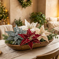 Velvet glitter poinsettias in a wooden dough bowl centerpiece